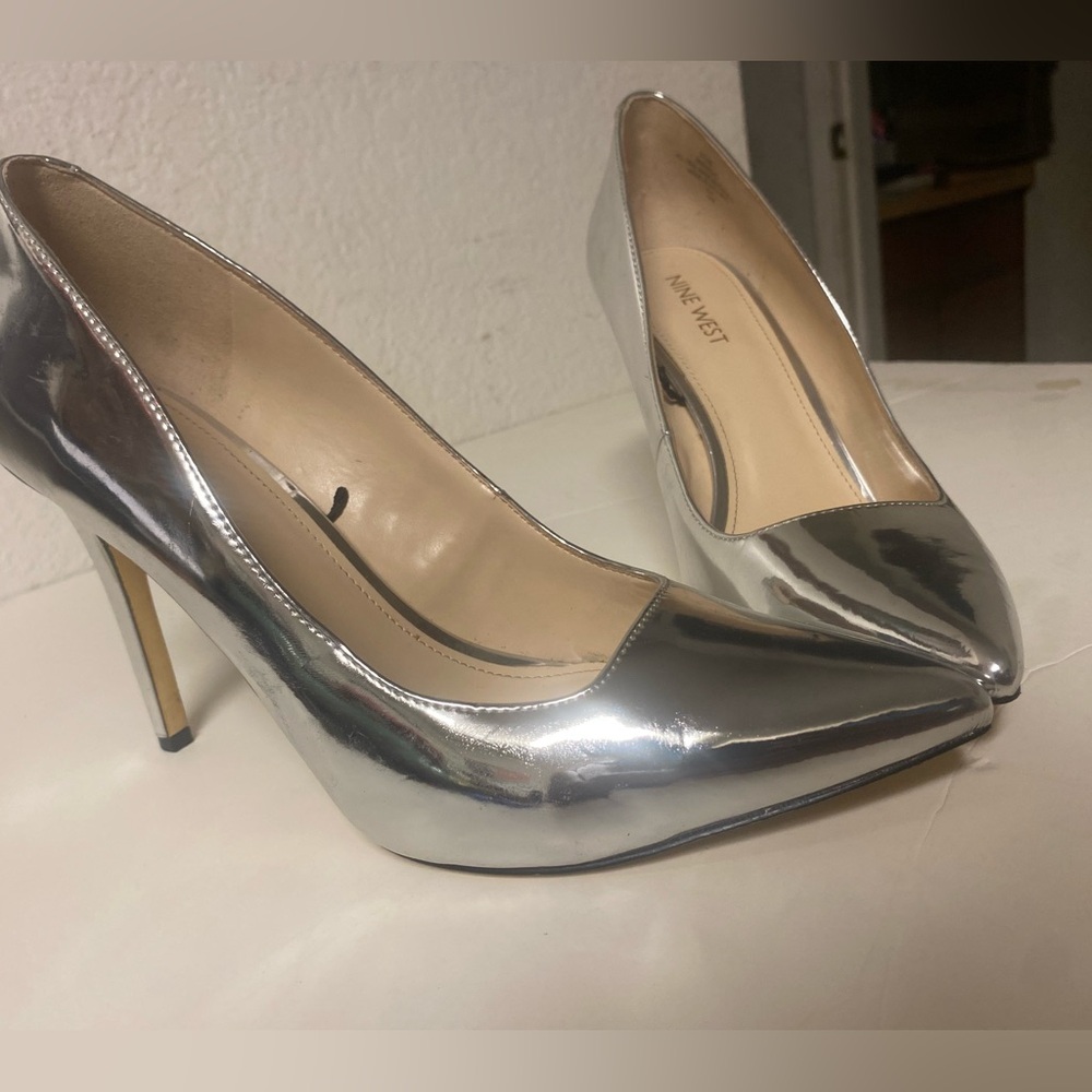Metallic mirror nine was size 9.5 used